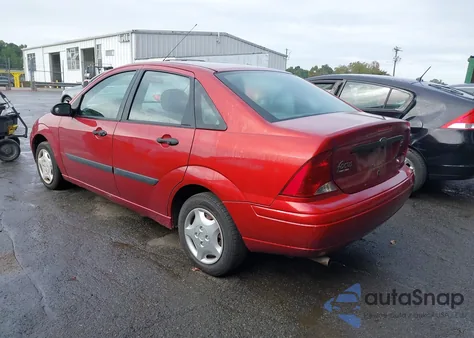 2004 Ford Focus Lx z USA, uszkodzony, nr VIN 1FAFP33PX4W121241